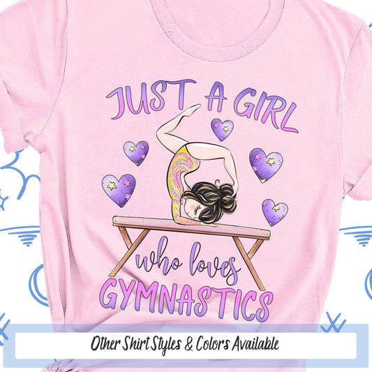 a pink shirt with a girl doing gymnastics on it