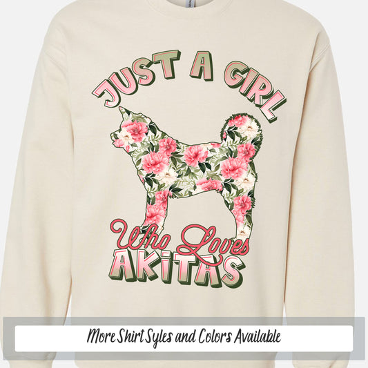 a white sweatshirt with pink flowers on it