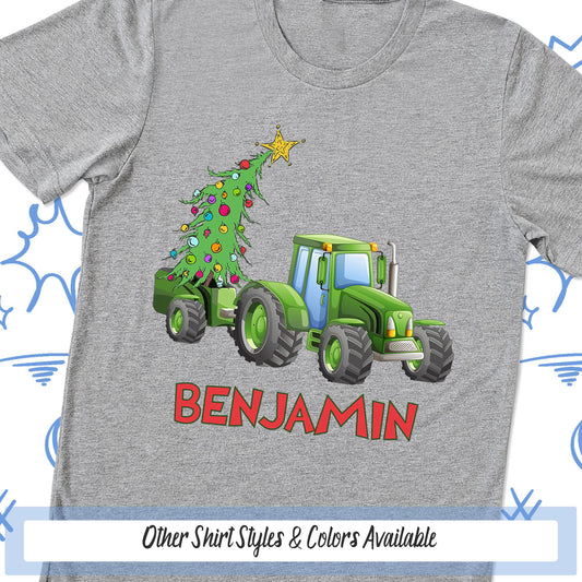 a gray shirt with a green tractor and a christmas tree on it