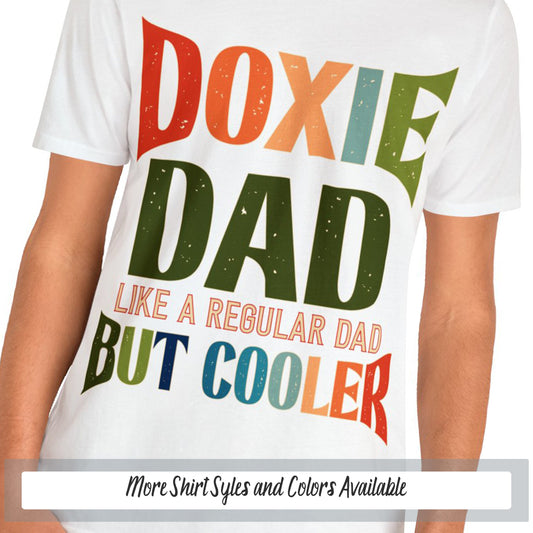 a man wearing a white shirt that says doxie dad but cooler