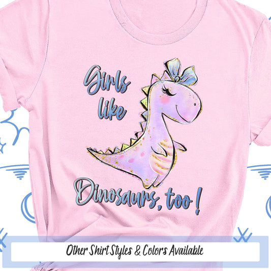 a pink t - shirt with the words girls like dinosaurs too on it