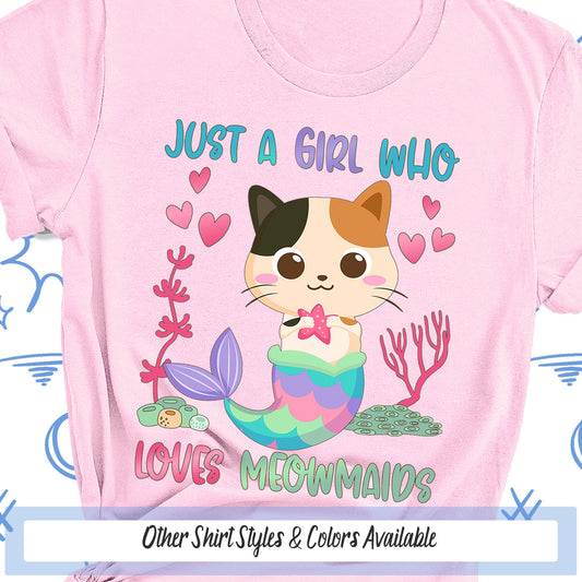 a pink shirt with a cat wearing a mermaid tail