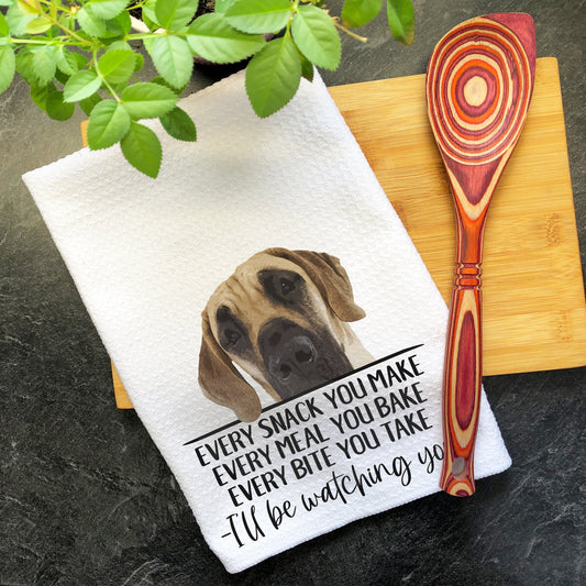 a kitchen towel with a picture of a dog on it
