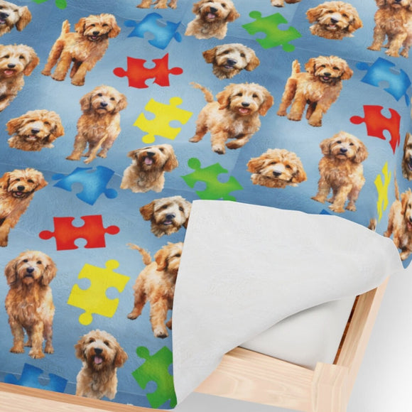 a bed with a dog pattern on it