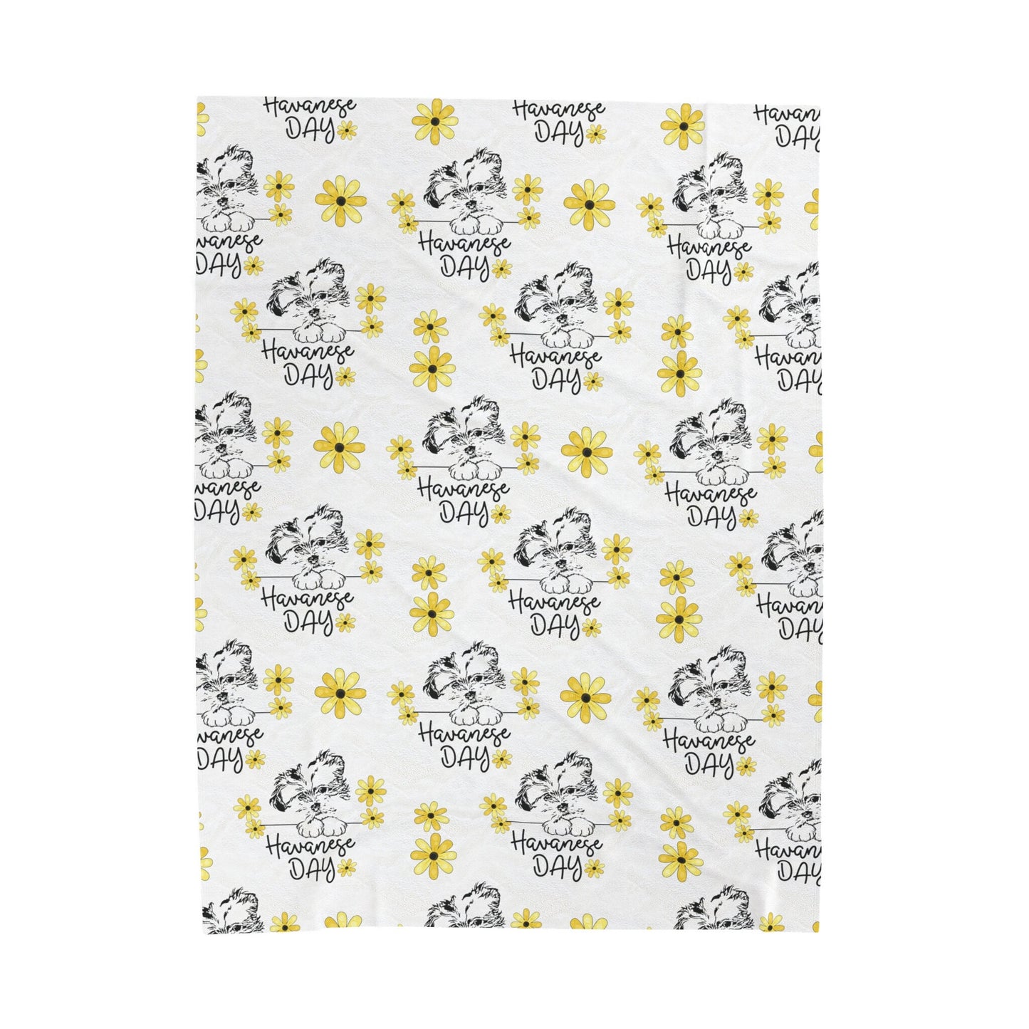 a white towel with yellow flowers on it