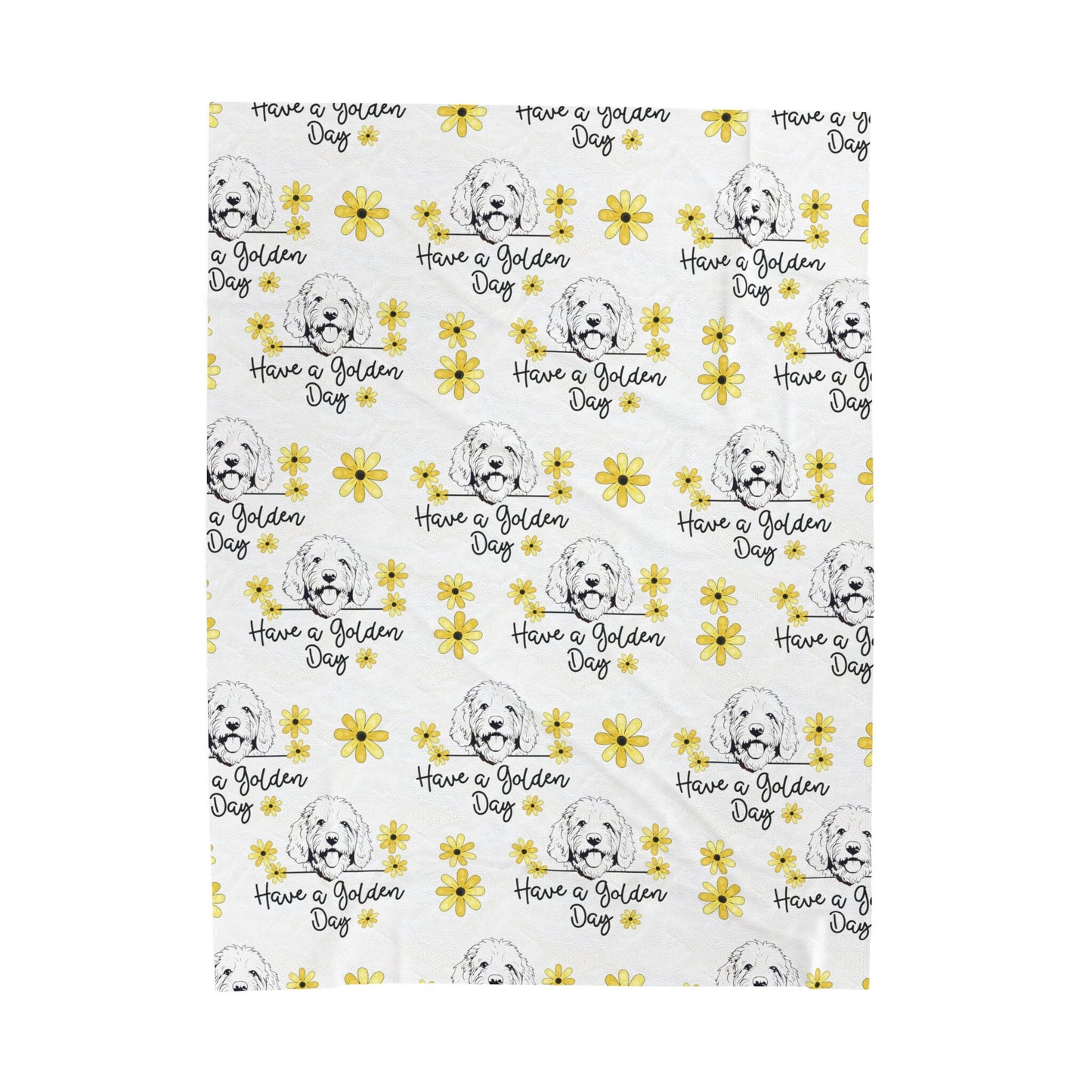 a white blanket with yellow flowers on it