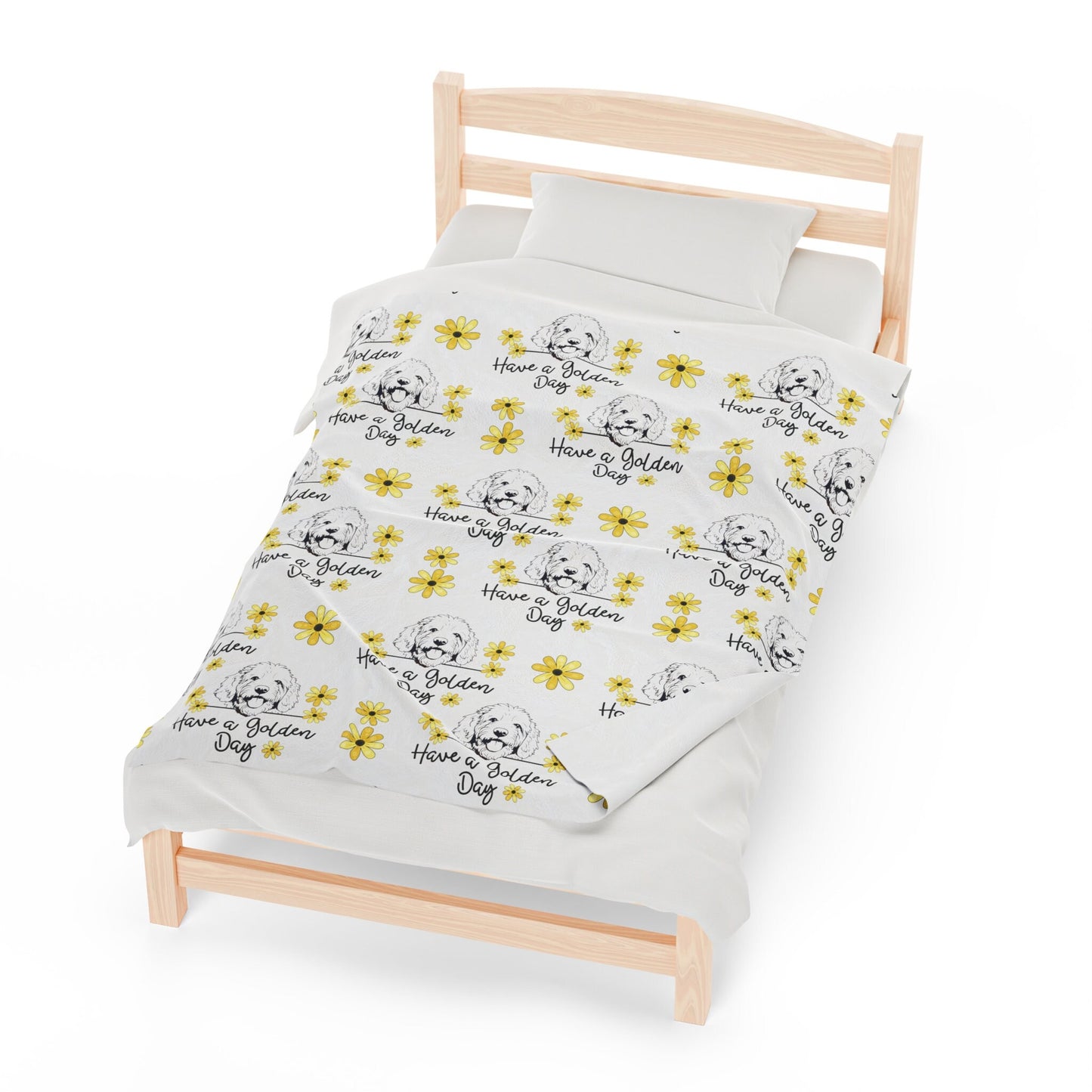 a bed with a white sheet and yellow flowers on it