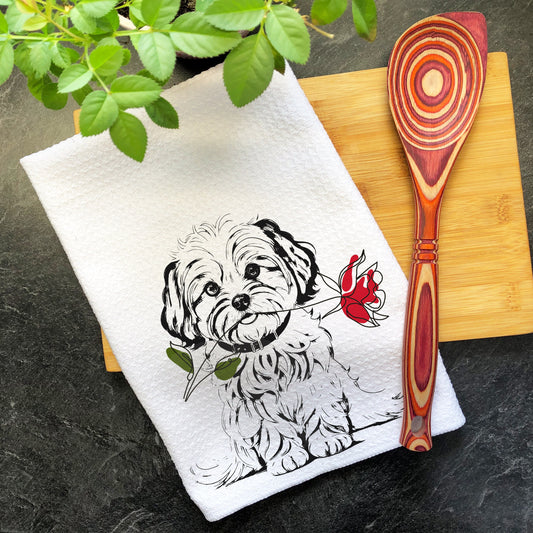 a tea towel with a picture of a dog on it
