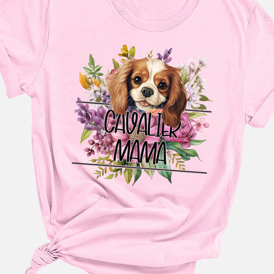 a pink t - shirt with a picture of a dog on it
