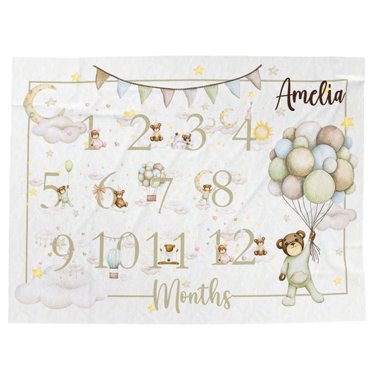 a birth announcement with a teddy bear holding a bunch of balloons