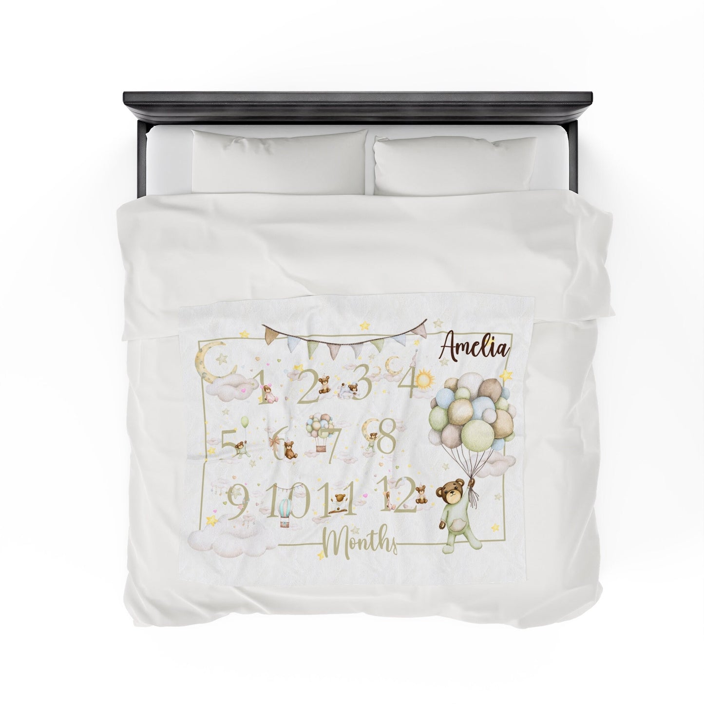 a bed with a white comforter and a black headboard