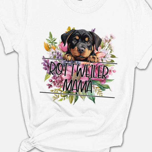 a white t - shirt with a black and brown dog on it