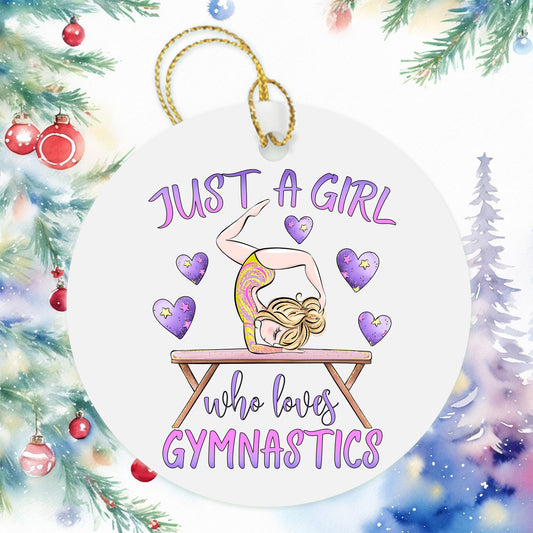 a christmas ornament with a girl doing gymnastics