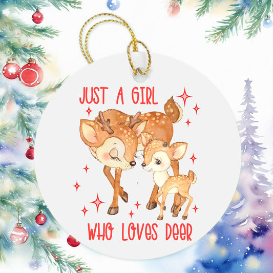 a christmas ornament with a picture of two baby deers