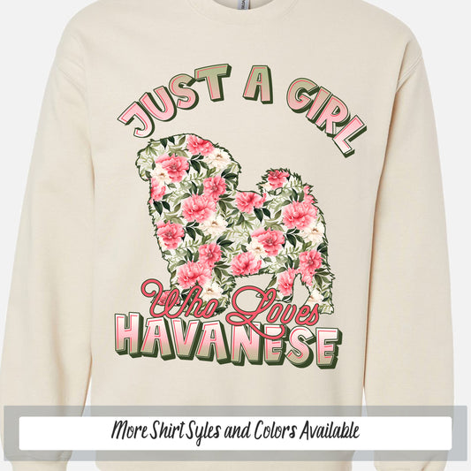 a white sweatshirt with pink flowers on it
