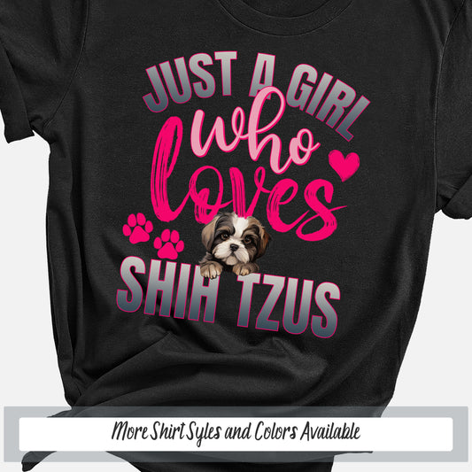 a black shirt with pink lettering that says just a girl who loves shih t
