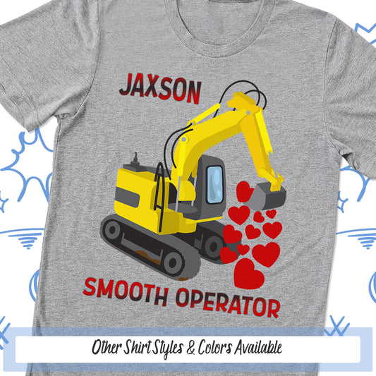 a gray shirt with a yellow excavator on it