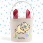 a small bag with two pink bows in it