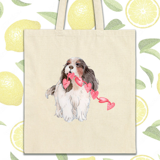 a bag with a picture of a dog holding a bow