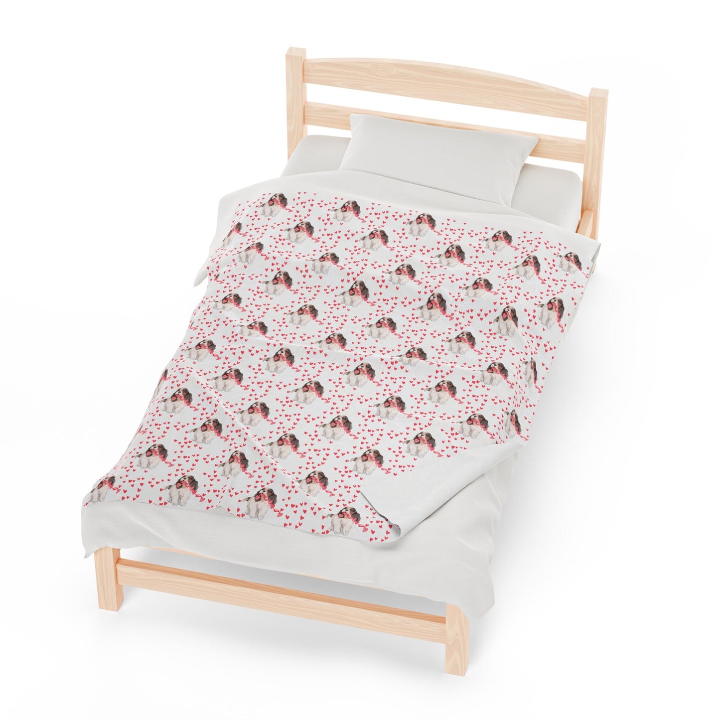 a bed with a red and white bedspread on it