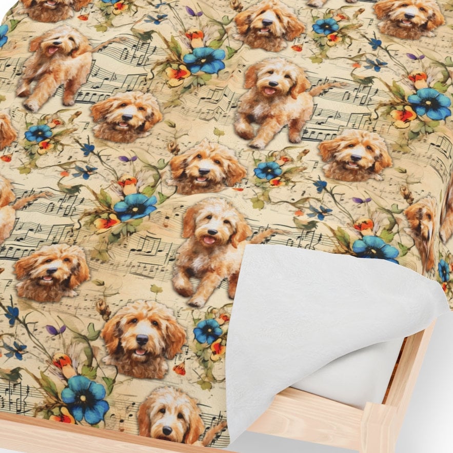 a small bed with a dog print on it