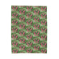 a green background with pink flowers on it