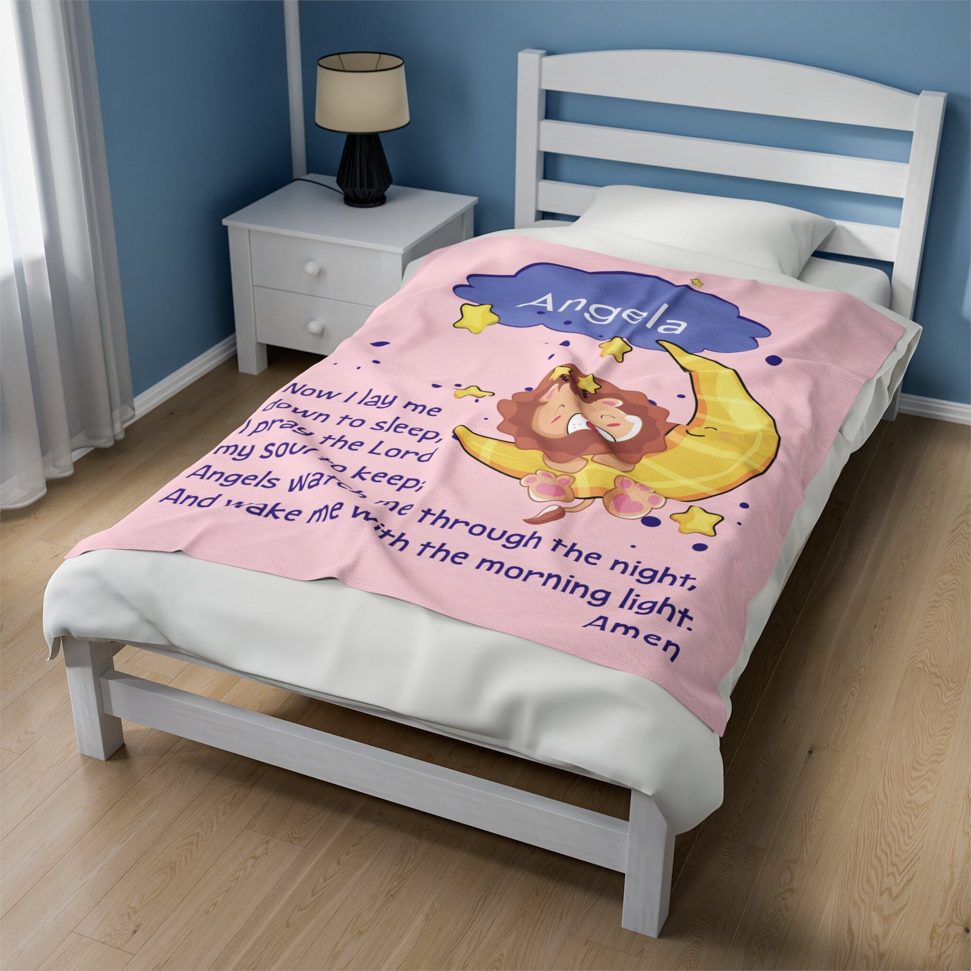 a bed with a pink comforter on top of it