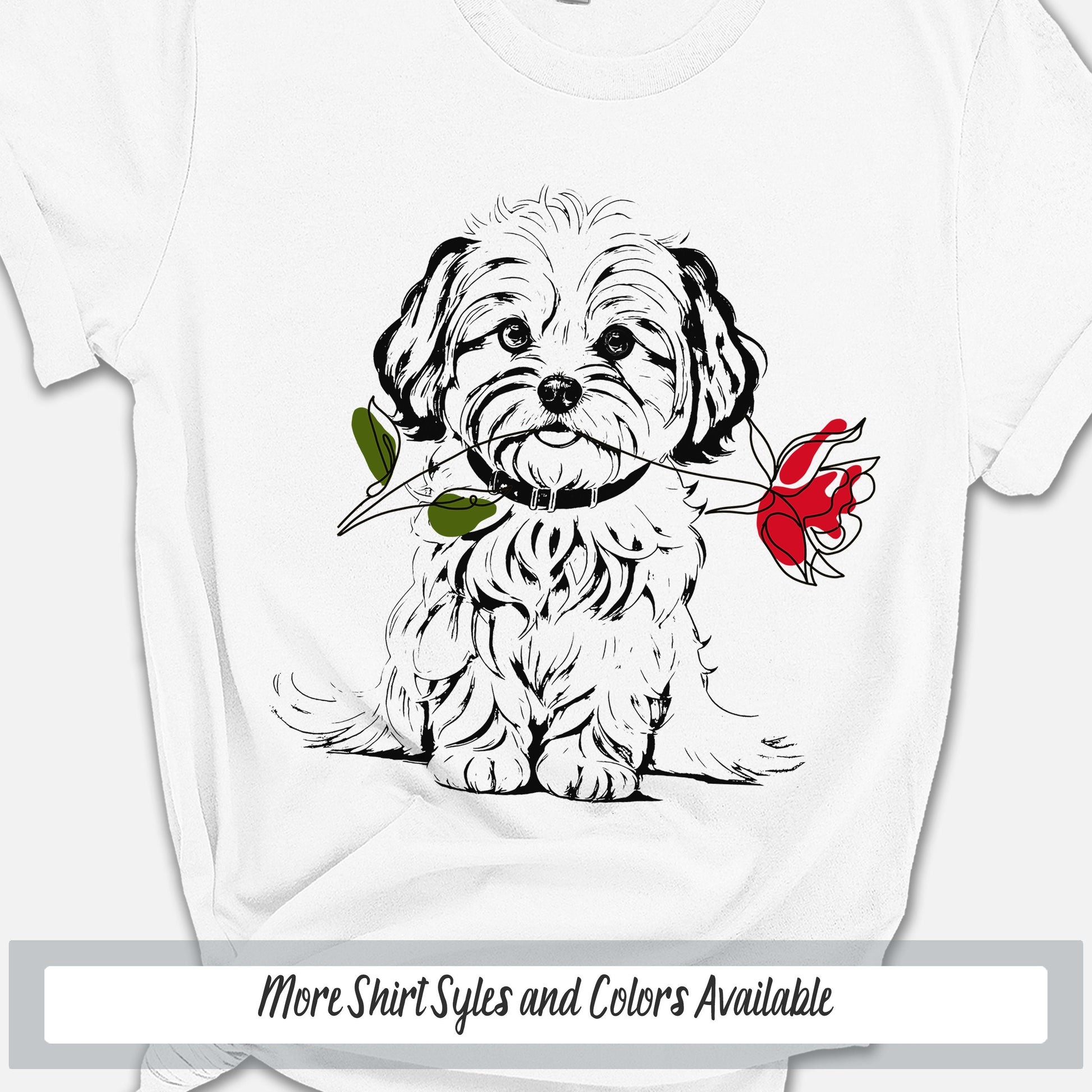 a dog with a rose in its mouth on a white shirt