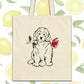 a white dog with a flower in its mouth