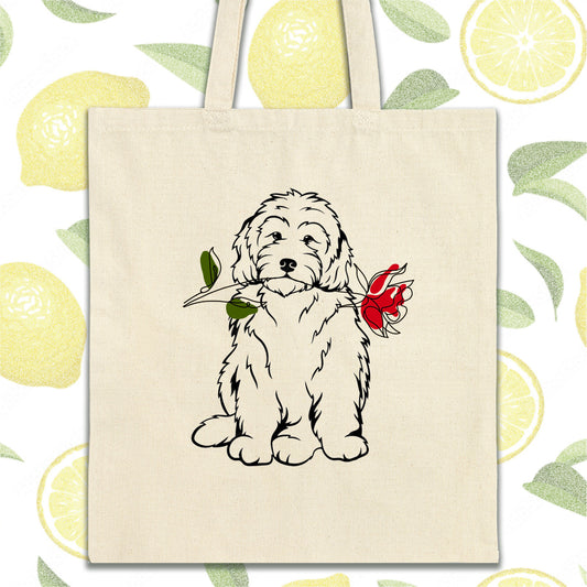 a white dog with a flower in its mouth