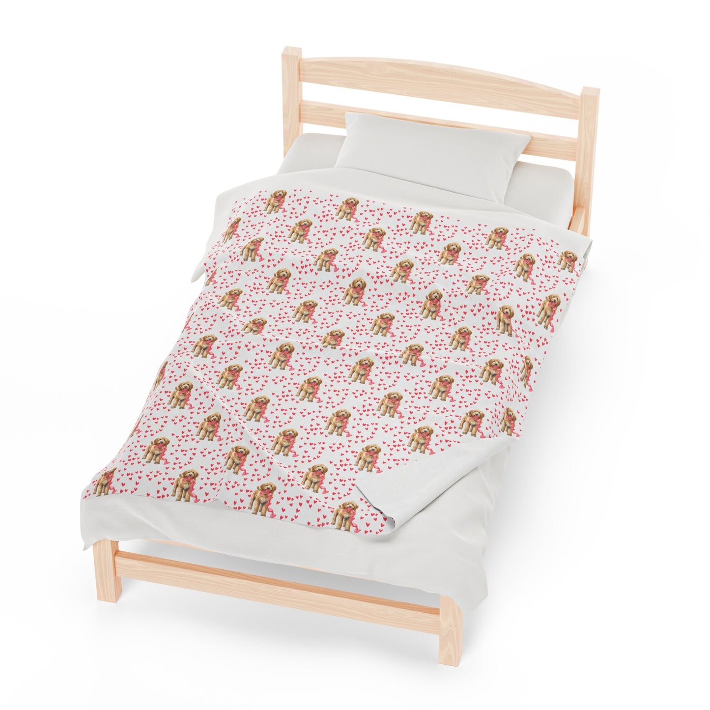 a bed with a white sheet and a wooden headboard