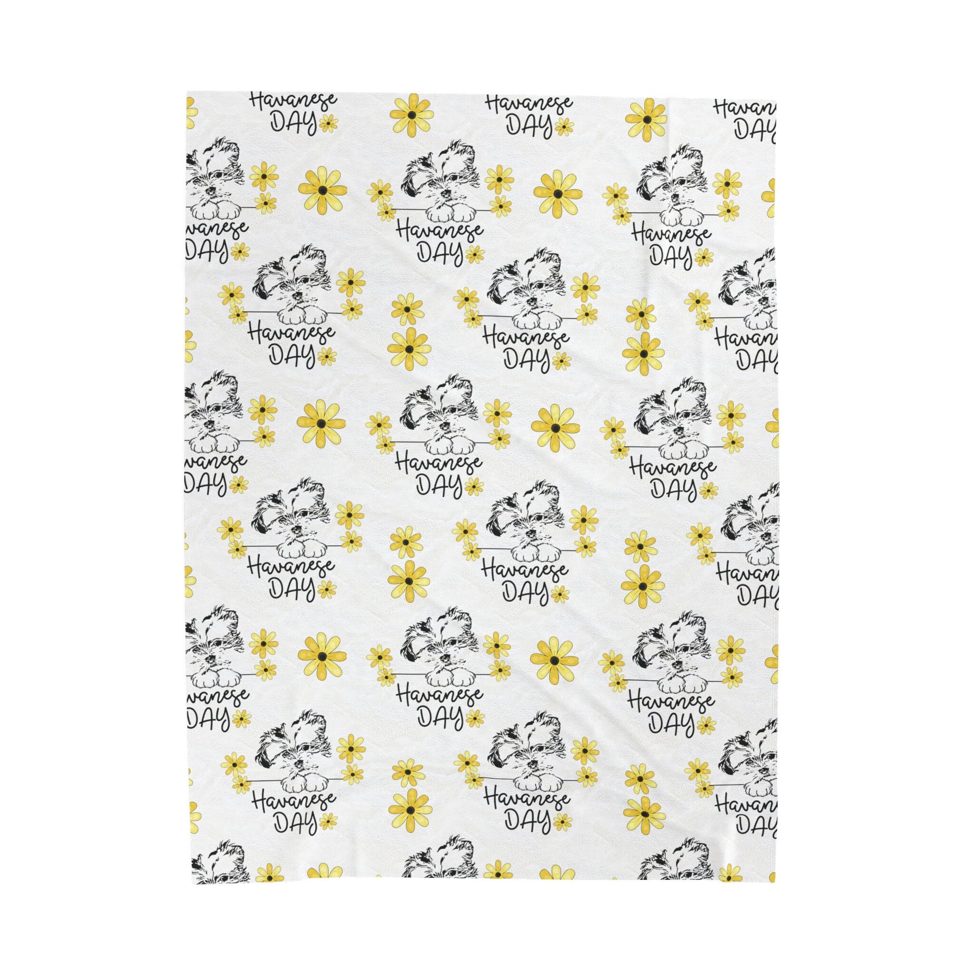 a white towel with yellow flowers on it
