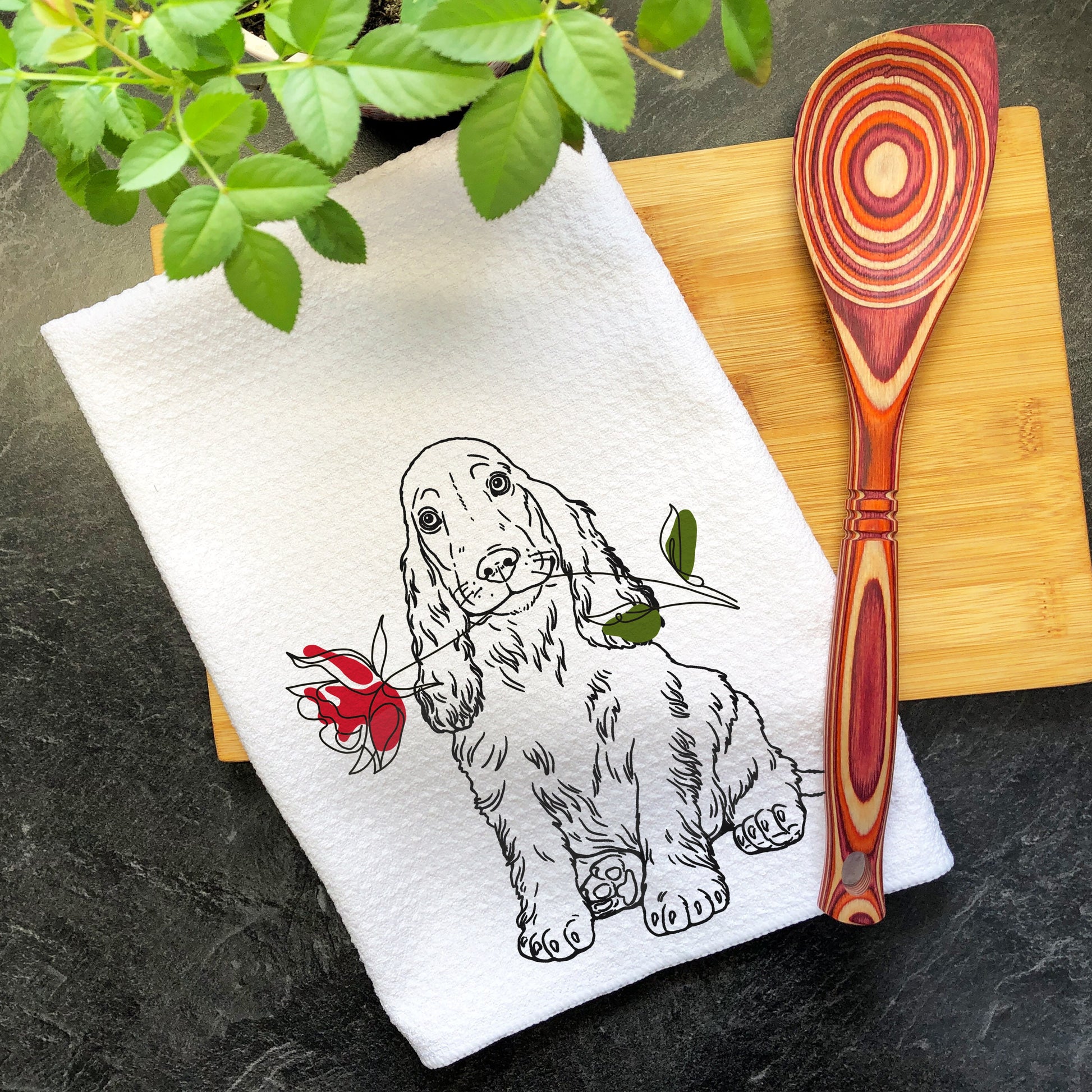 a kitchen towel with a picture of a dog on it