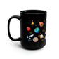a black coffee mug with a space theme on it