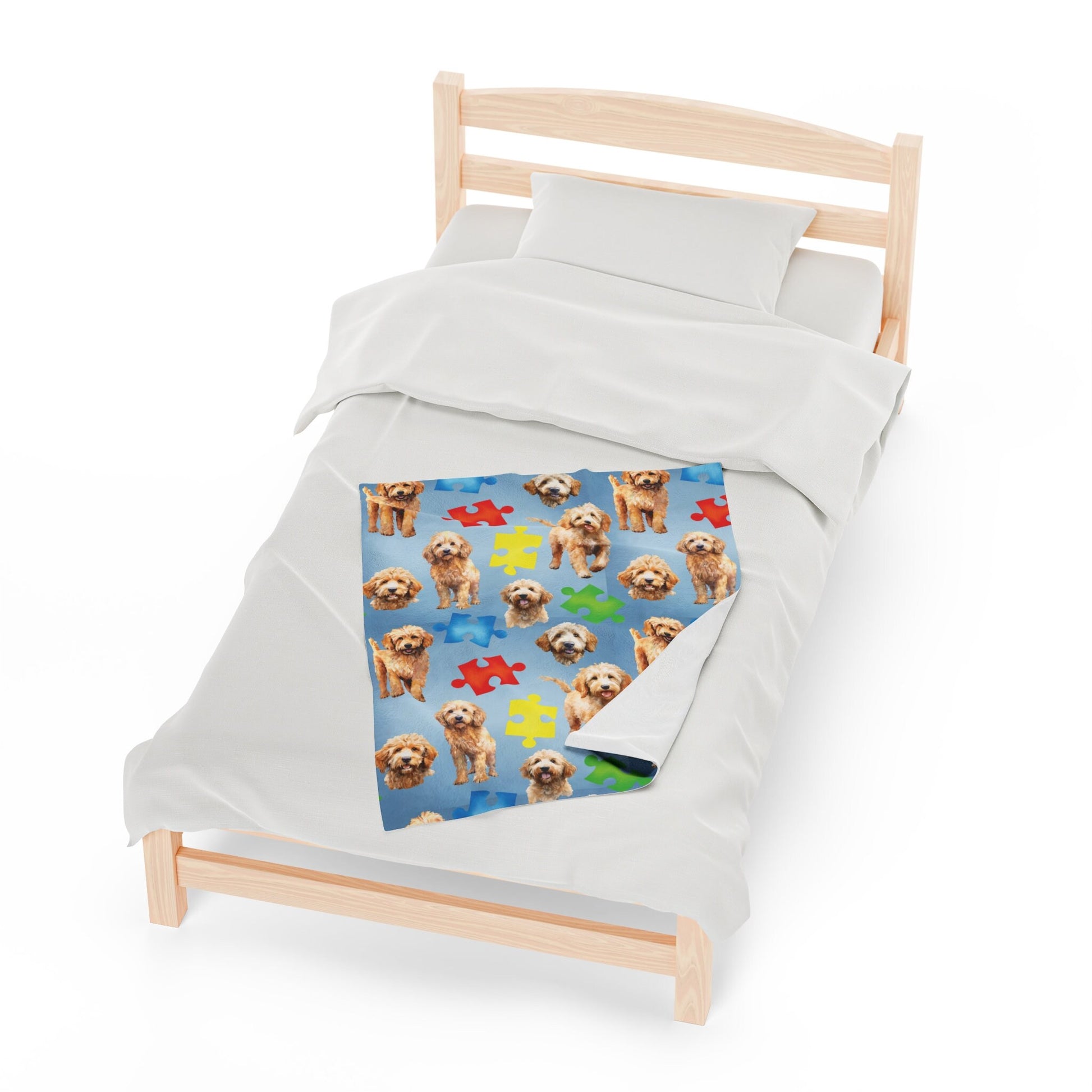 a bed with a white sheet and a picture of a dog on it