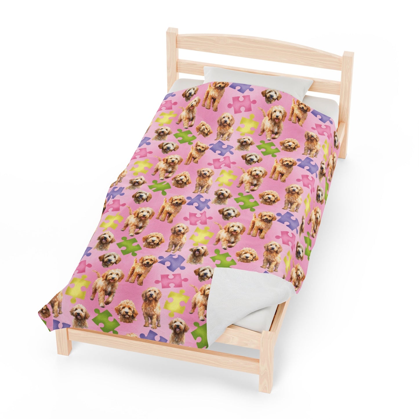 a small bed with a dog pattern on it