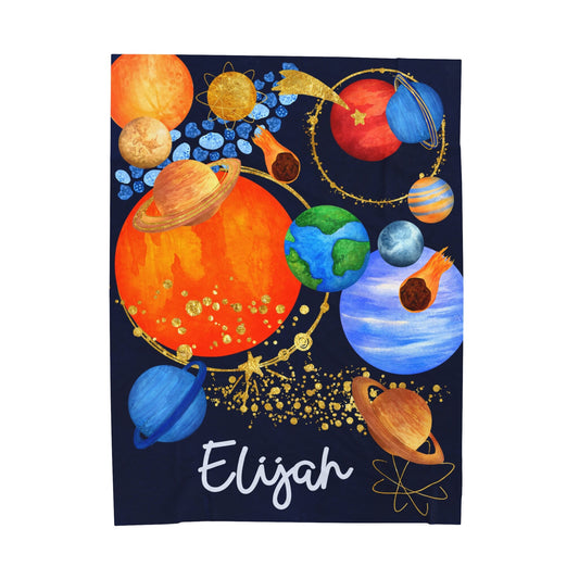 a towel with a picture of the planets on it
