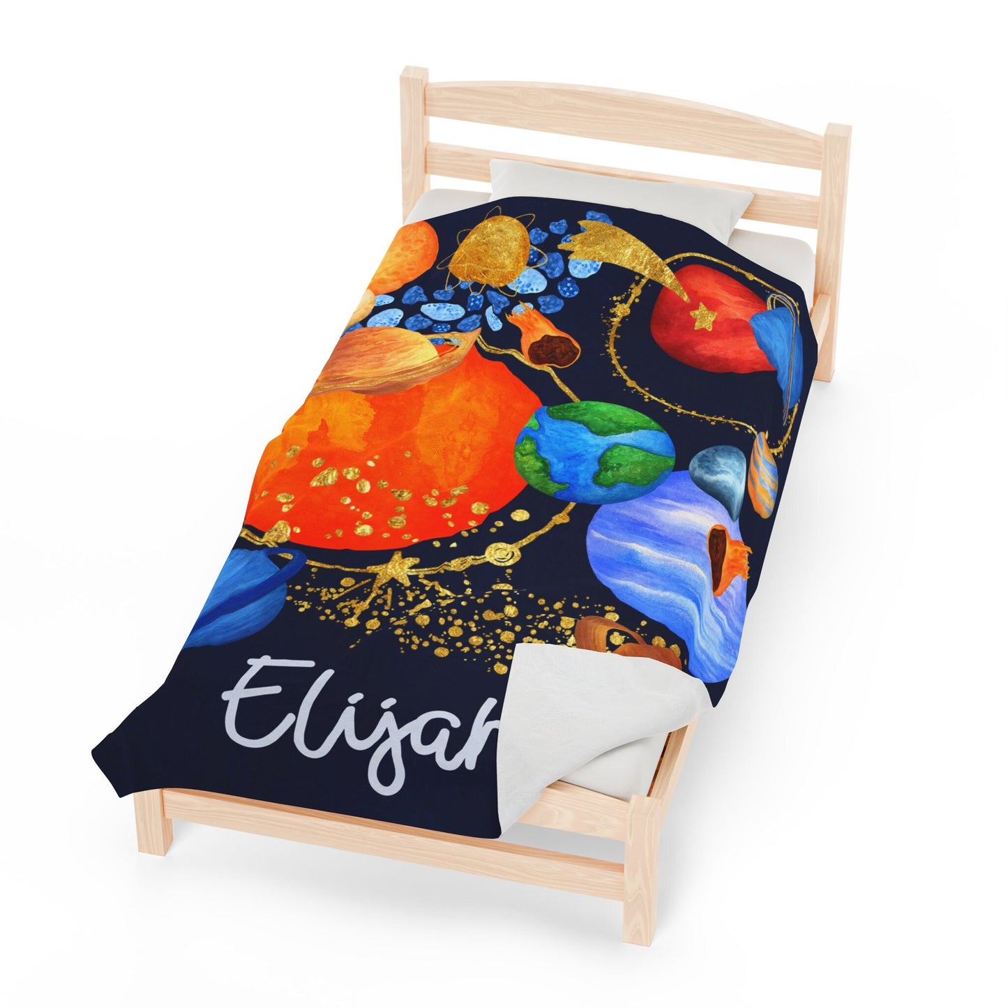 a bed with a blanket on top of it