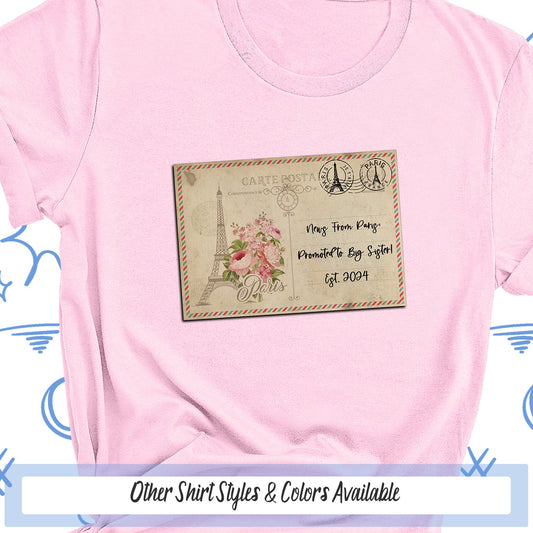a pink t - shirt with a picture of the eiffel tower