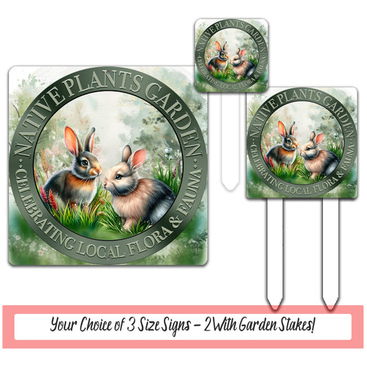 a couple of rabbits sitting on top of a green field