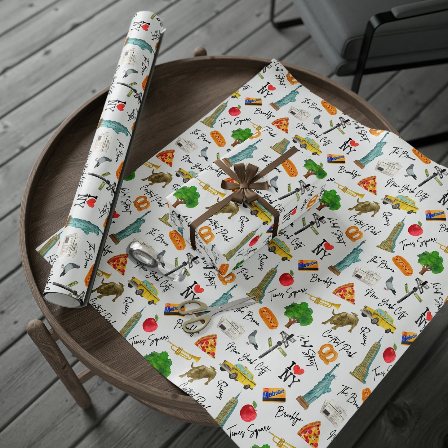 a table topped with wrapping paper and a knife