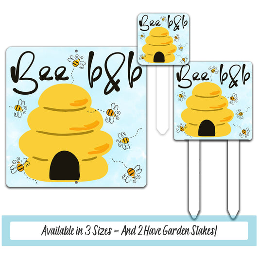 a set of two bees and a beehive on a stick