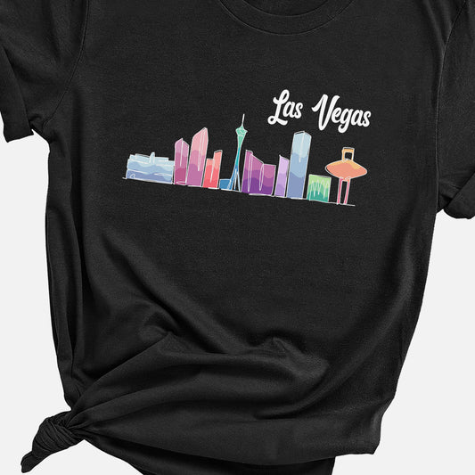 a black t - shirt with a picture of the las vegas skyline