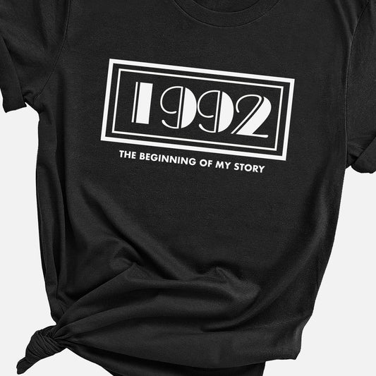 a black t - shirt with the year 1932 printed on it